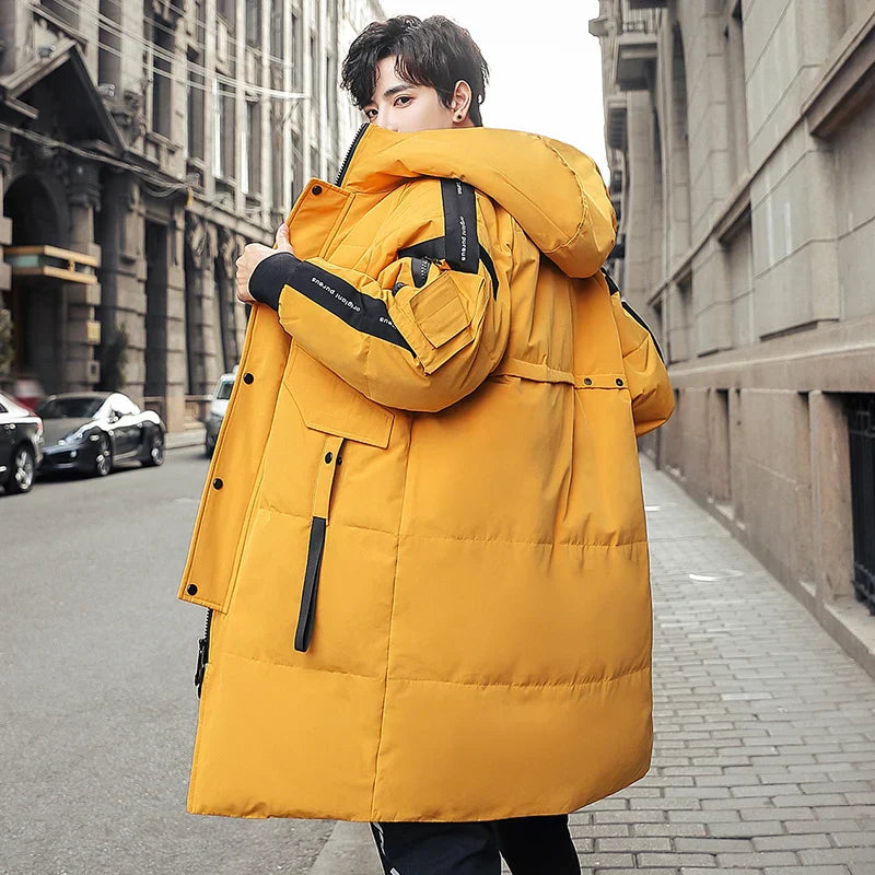 Men’s long yellow down jacket with hood and multiple pockets for winter warmth and style